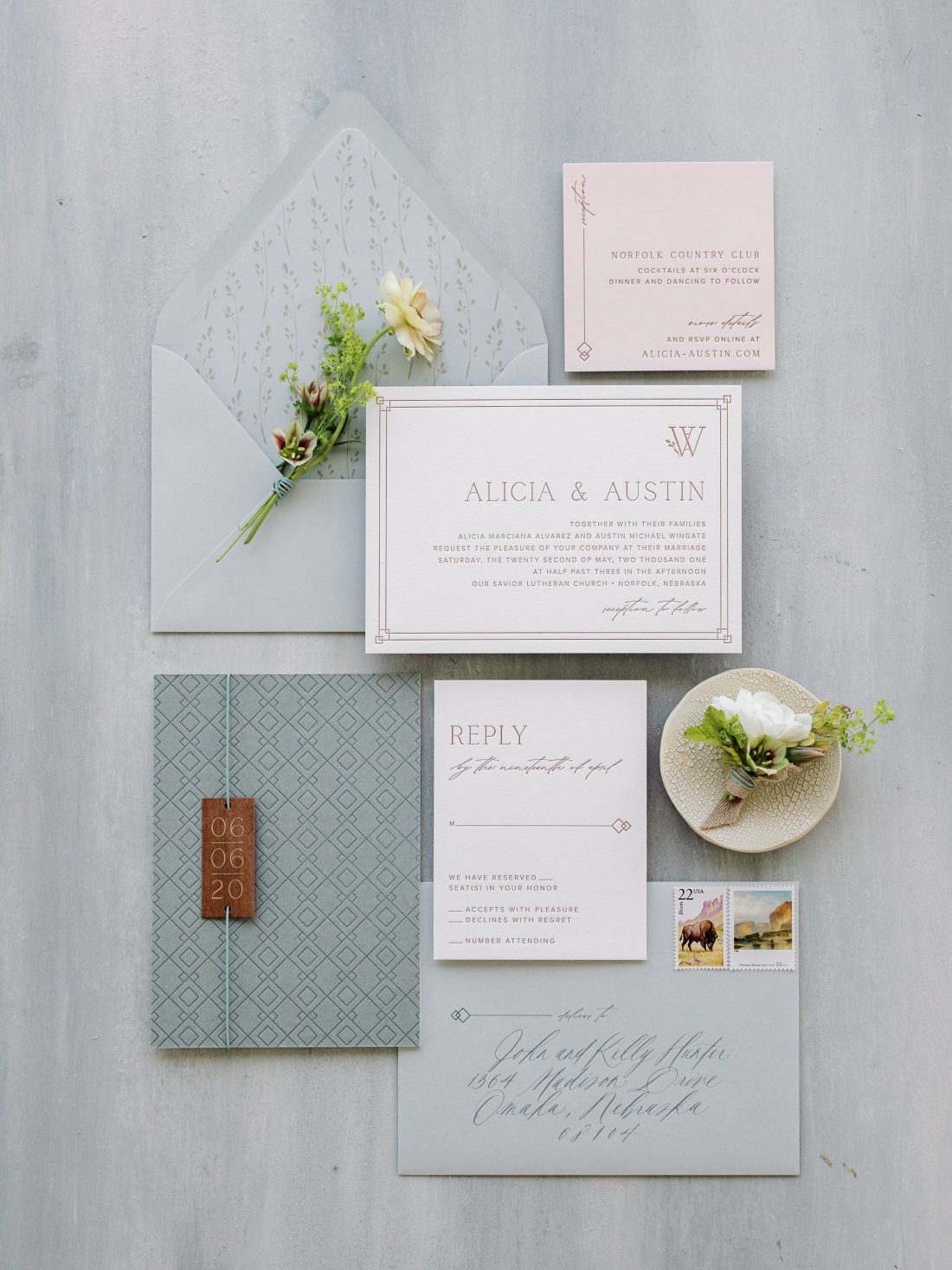 The letterpress invitations were pressed into a suede-textured paper. The warmth of the rust-colored ink provided a nice contrast to the blue duplexed paper and envelopes.